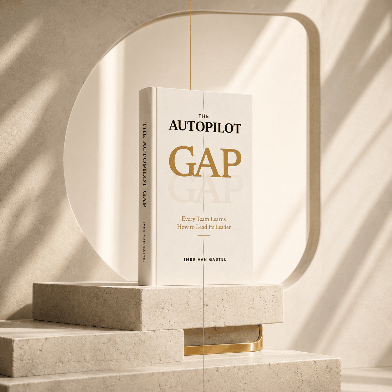 The Autopilot Gap book displayed on a limestone architectural plinth